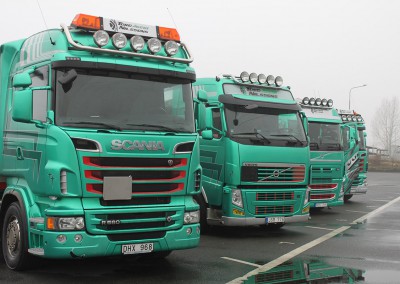 Lastbilsflotta bestående av fyra fordon